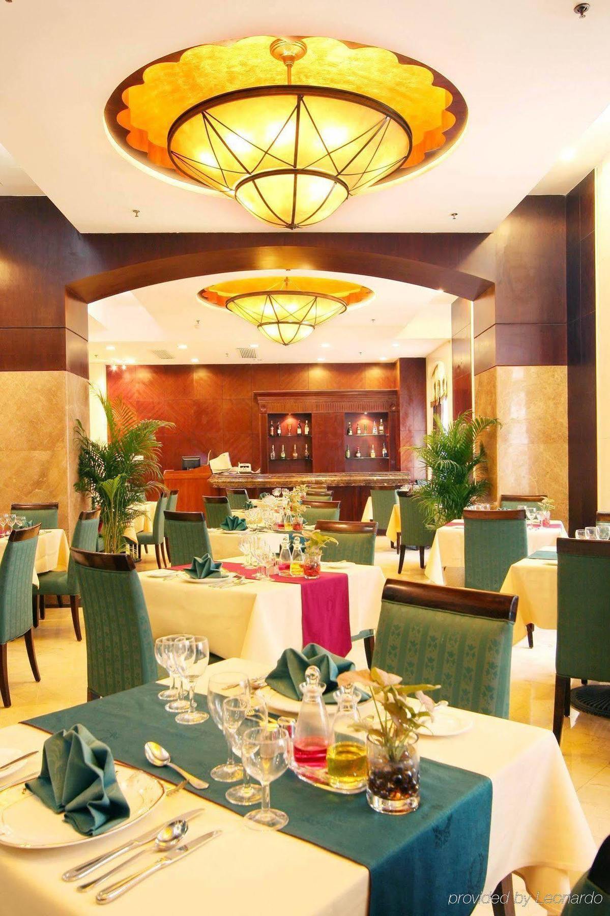 قوانغتشو فندق جراند - مجموعة جراند لإدارة الفنادق المطعم الصورة